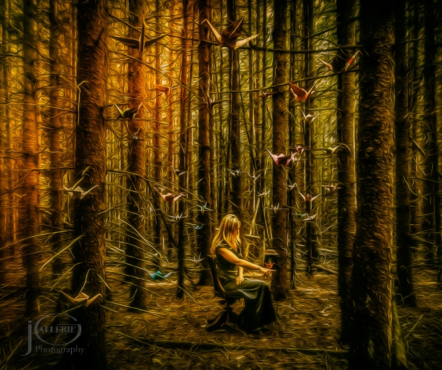 Paper cranes gather in the pines around a beautiful woman.